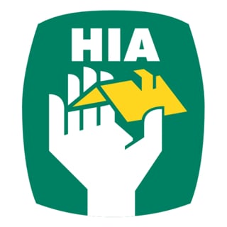 HIA logo featuring a white hand holding a yellow arrow on a green background, representing real estate or housing association